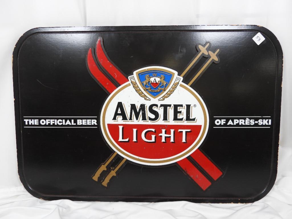 Vintage Amstel light tavern sign: Promotional bar sign feature Amstel light beer in good condition feature skis on its display to show it is the preferred beer of the "Apries-Ski" culture
