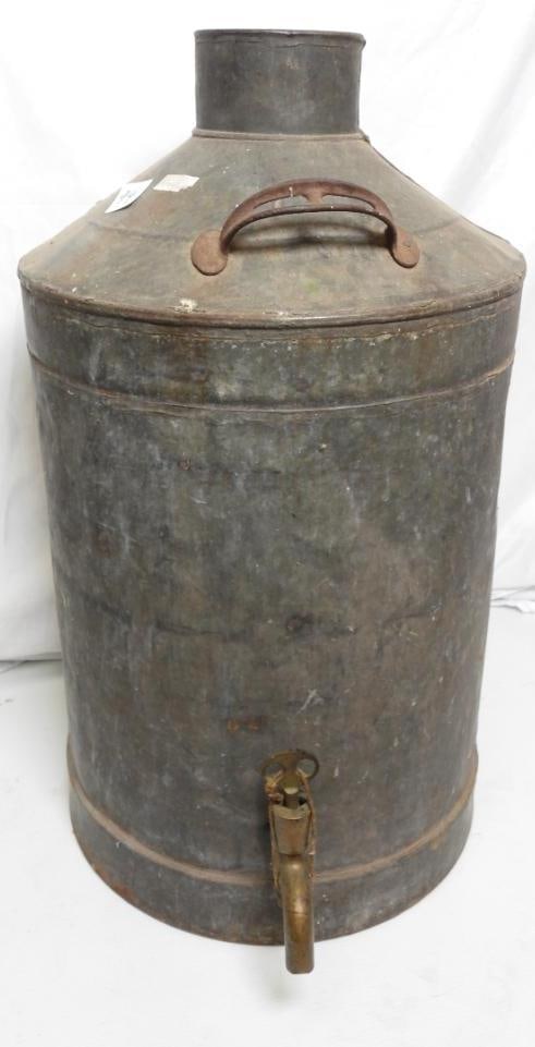 Vintage 5 Gallon Metal Water Cooler: Made of Galvanized steel, This water cooler is in decent condition showing only a little rust at its base and some dents around its back, also the brass release nozzle is loosely secured but otherwise