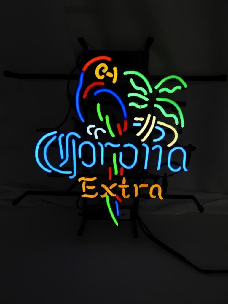 Neon Corona Extra Bar Sign Lighted works: 16" x 16" Neon sign in working condition displays Corona in white lettering, a parrot in yellow + blue + red with a tail extending down behind the "Extra" lettering in yellow