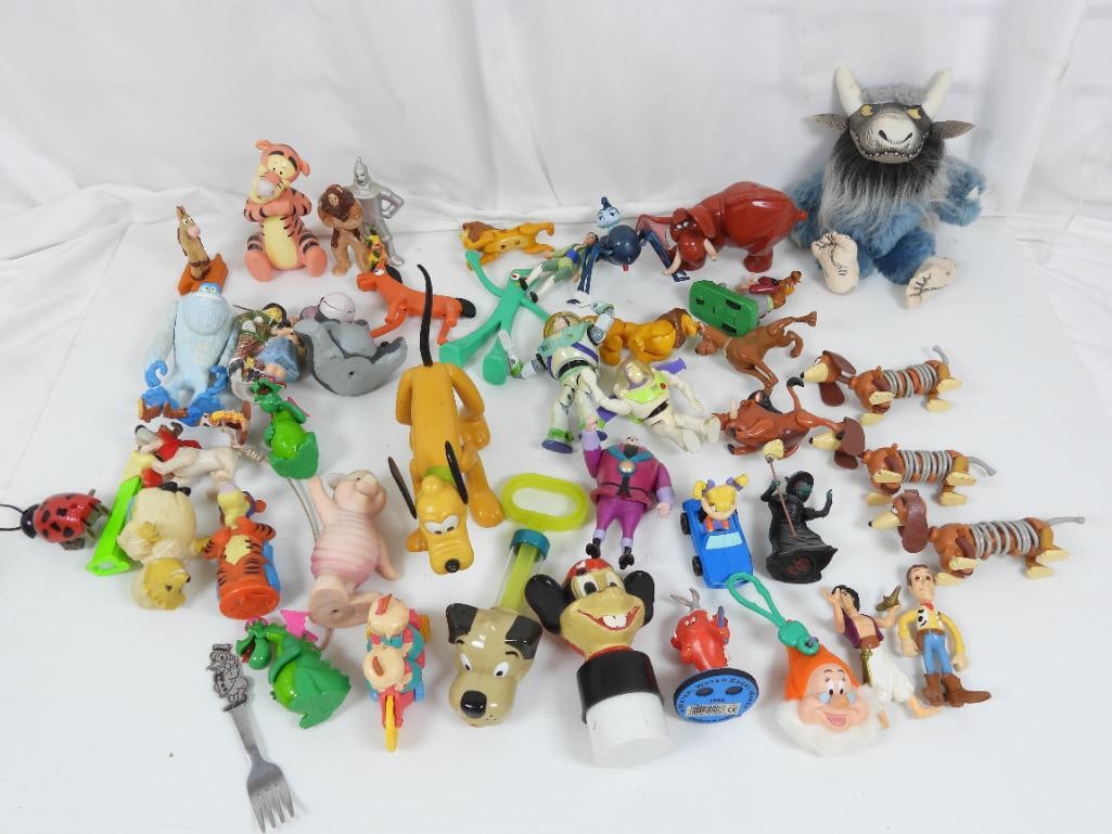 Lot of 40 Disney, Pixar, and other Classic toys: FOR DISPLAY ONLY. CHILD SAFETY NOT GUARANTEED. WE ASSUME NO LIABILITY FOR INJURY OR ILLNESS. Characters from Buzz lightyear, woodie, slink, Monsters Ink sully, Pokey, Lion King, Where the Wild things 