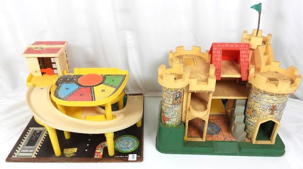 Lot of 2 Vintage Fisher Price Parkin center and Castle: FOR DISPLAY ONLY. CHILD SAFETY NOT GUARANTEED. WE ASSUME NO LIABILITY FOR INJURY OR ILLNESS. 1960's F.P. Parking Ram service Center, plus Fisher price Play Family Cattle