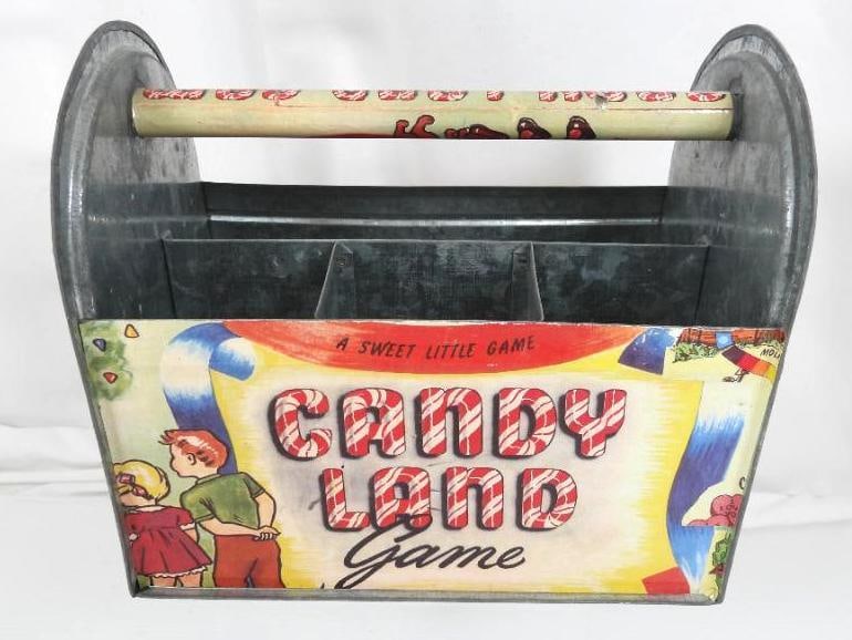 Vintage metal CANDY LAND GAME caddy RARE: FOR DISPLAY ONLY. CHILD SAFETY NOT GUARANTEED. WE ASSUME NO LIABILITY FOR INJURY OR ILLNESS. No brand notes. Measures: 8.5" l x 5.25" d x 7.5" h. Divided caddy with 4 compartments.
