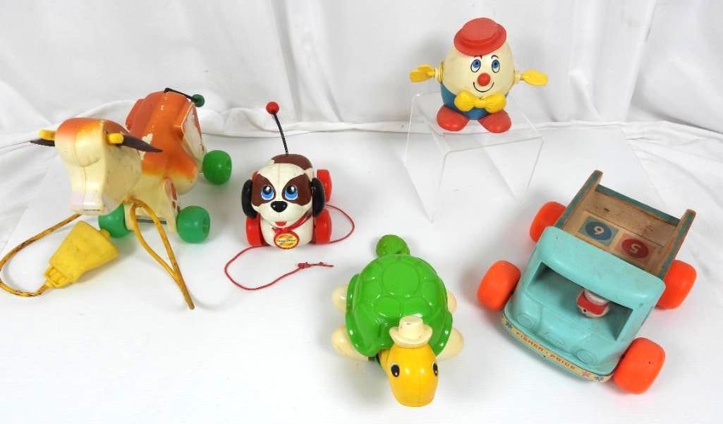Lot of 6 Vintage Fisher Price, Cragston & more pull toys: FOR DISPLAY ONLY. CHILD SAFETY NOT GUARANTEED. WE ASSUME NO LIABILITY FOR INJURY OR ILLNESS. Includes 1965 Cragstan Wacky Melon pull toy - no cord, Vintage 1960's wood and plastic Fisher price Milk wa