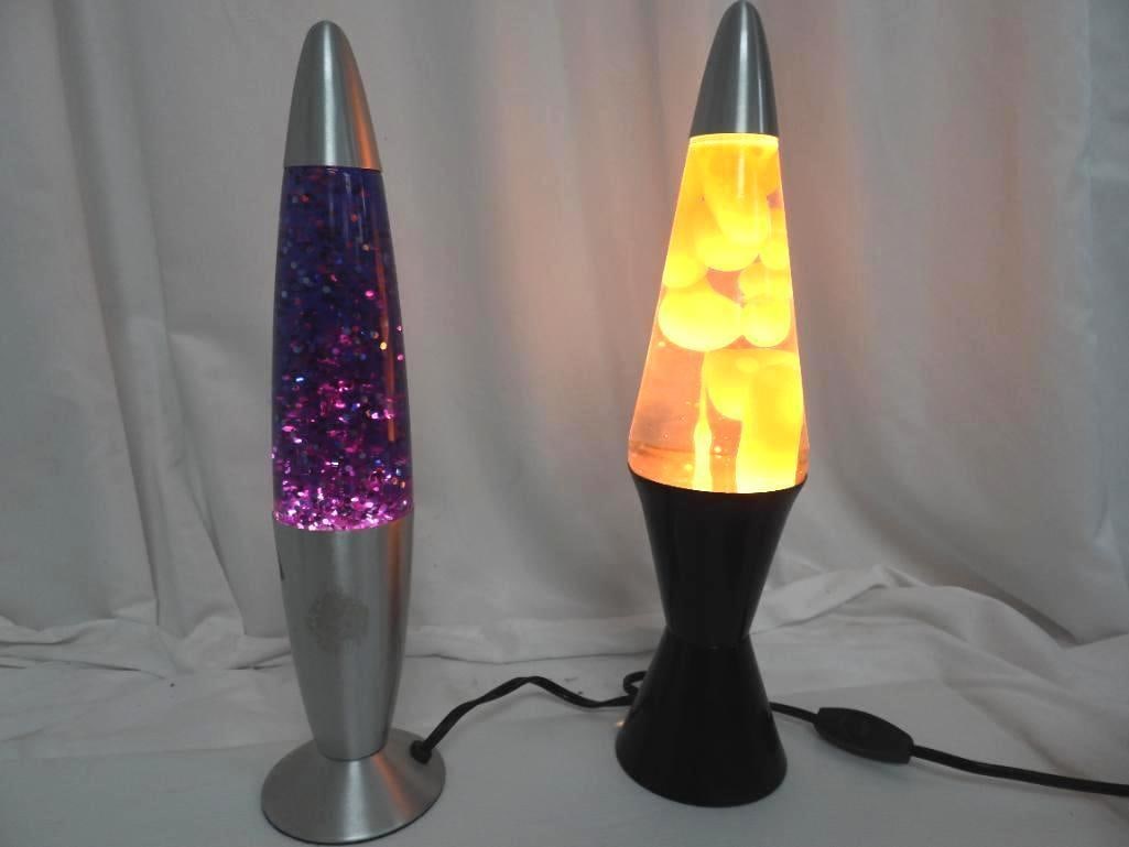 Vintage Double Lava Lamp WORKS: FOR DISPLAY ONLY. CHILD SAFETY NOT GUARANTEED. WE ASSUME NO LIABILITY FOR INJURY OR ILLNESS. These are connected wired together. The blue side is solid blue, the yellow is a Lava lamp. Works.