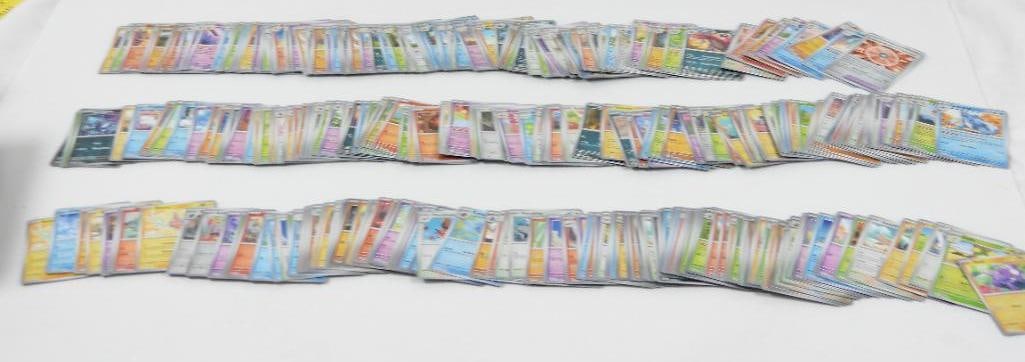 Lot of 300 + Assorted POKEMON Collectible Cards in box: Box may not be the original box for these cards. Unchecked Assorted Pokemon Cards in excellent condition.