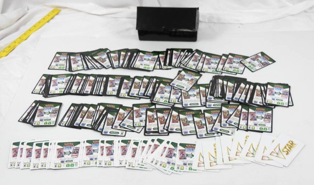 Lot of 275+ POKEMON Code Cards in box: Box may not be the original box for these cards. Unchecked Assorted Pokemon Cards in excellent condition.