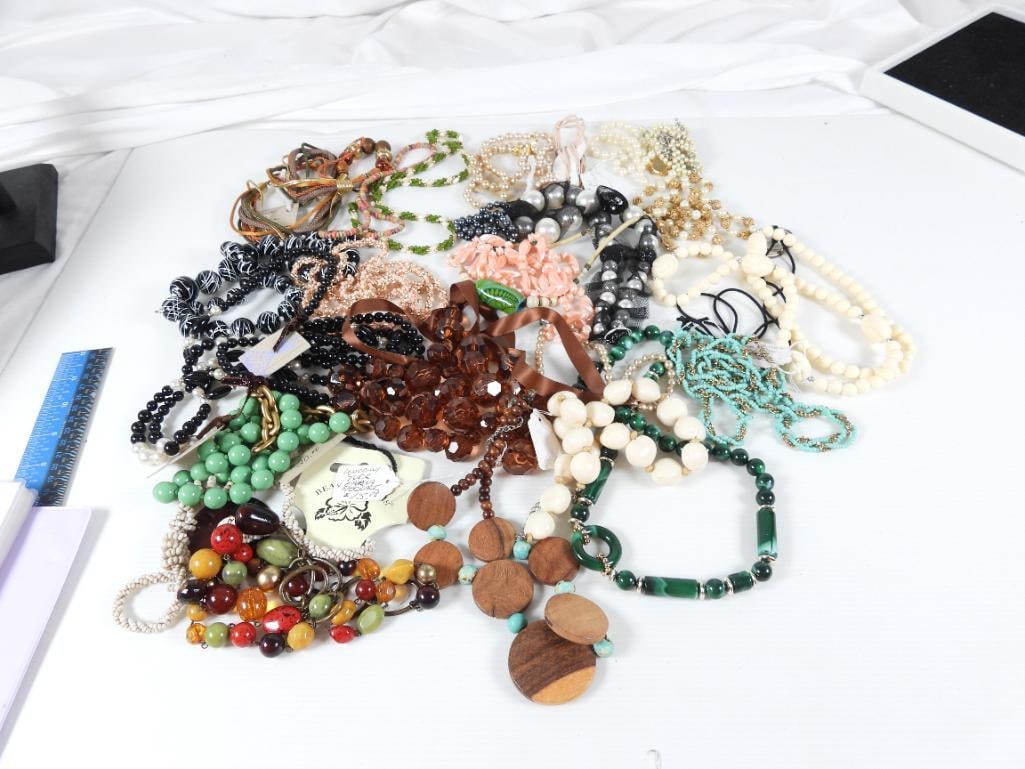 Lot of 16 Vintage Beaded Necklaces.: Assorted lengths and styles. Natural and faux pearls, wood, genuine stones, like coral, turquoise, Crystals, beads of all kinds, acrylic, Gold tone, silver tone brown TIE BEADS, GLASS BEADS (POSSIBLY