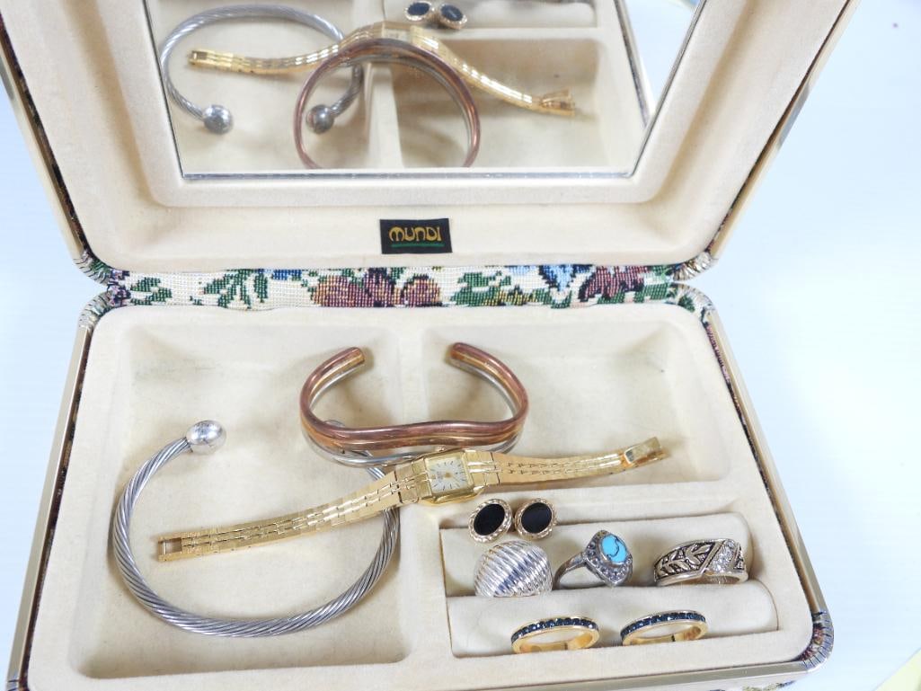 Jewelry Box lot of costume jewelry: O -Ray twisted cuff, tri-color metal curl bracelet Citizen Ladies watch, black onyx earrings , 5 rings includes: sterling turquoise ring with missing side stones, 18kt white gold G.E. ring, 2 gold ton