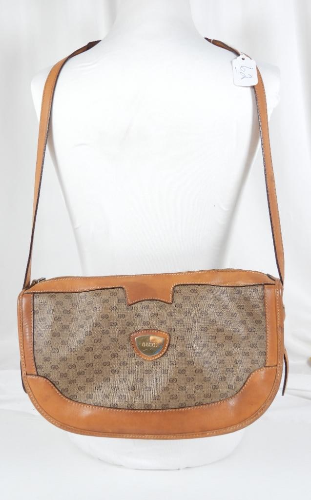 AUTHENTIC Gucci Vintage Micro GG Supreme Ladies Handbag AUTHENTIC: GUARANTEED AUTHENTIC Ladies Gucci Designer handbag. Vintage Small Micro GG Gucci logo handbag shoulder crossbody bag with adjustable strap Zip closure at top. Width 12" Dept. 3.5" Height 7.25". should