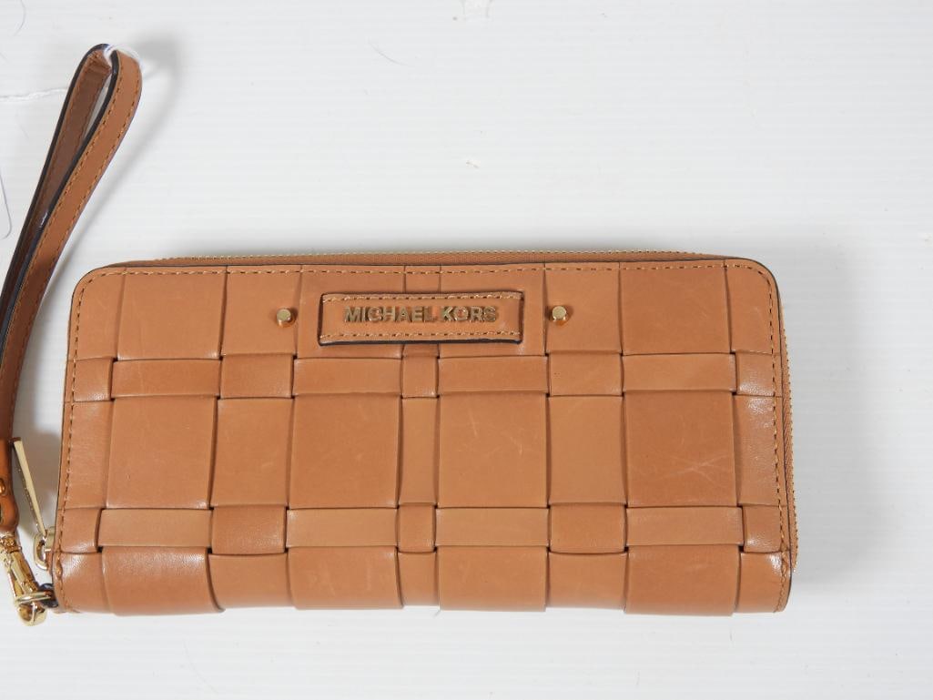 AUTHENTIC MICHAEL KORS Vivian Continental Wallet Wristlet Tan: GUARANTEED AUTHENTIC MICHAEL KORS Ladies Designer Zip around Travel Continental Wallet Wristlet. Braided weave tan butterscotch color leather zip around coordinates with lot 70 Vivian handbag. Tan lea