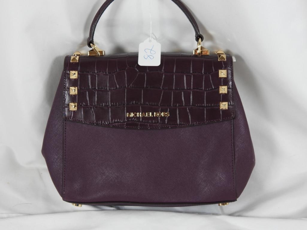NEW with Tags AUTHENTIC MICHAEL KORS KARLA Medium satchel: GUARANTEED AUTHENTIC MICHAEL KORS Ladies Designer handbag, satchel. Features Damson-Plum colored Croc-embossed leather and saffiano leather with gold stud detailing, Single handle. RETAILS $398.00. Fe