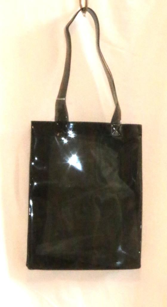 BURBERRY Vinyl tote Bag NEW: BURBERRY printed on the front. Opaque smokey clear vinyl. Measures: 14"H x 11"W x 4"D. Double handles stiched on 1.5"w with an 11" drop length. NEW Never used.