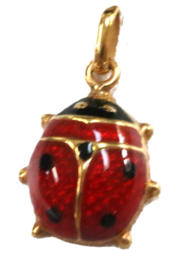 14kt gold lady bug pendant 1.1 gram.: Perfect NEVER WORN NEW condition vintage Enamel red and black lady bug in 14kt gold. Hallmarked 14kt. Measures: 7/8" long x 1/2"W. 4.9mm thick