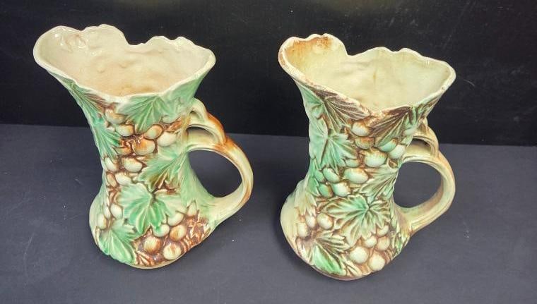 LOT OF 2 MCCOY VINTAGE SERVING PITCHERS: Featured are two picthers approx. 10" tall with a raised grape and leaf patter on each
