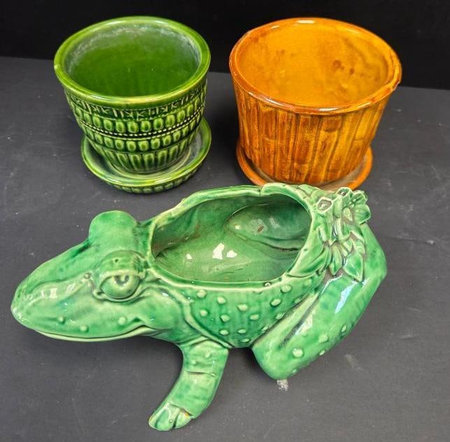 LOT OF 3 MCCOY VINTAGE PLANTERS: 2 Of the planters are of normal shape with brown and green patterning approx5"x5"x4.5" and one unqiue green from planter approx. 8"x5"x4"