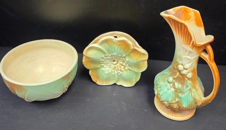 LOT OF 3 MCCOY VINTAGE VASES/BOWL: All 3 are themed in the same matte green and brown glaze with patterns of pinecones on the bowl 7"x7"x4", a large flower planter 6"x2"x6", and a grape vine pitcher 5.5"x4.5"x9.5"