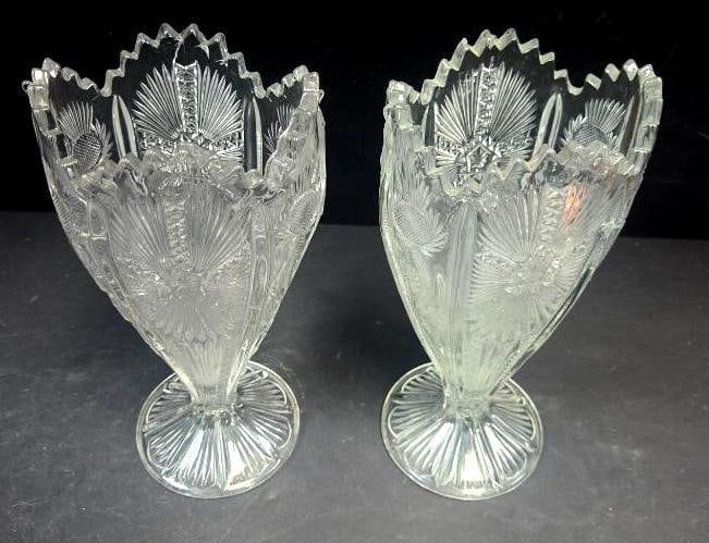 Pair of Pressed Glass Thistle Pattern Fan Vases, Zigzag Rim: Matching pair of fan-shaped thistle pattern vases with an angular zigzag scalloped rim, on round starburst-cut feet. Approx. 7"H x 4.5"W at rim each.
