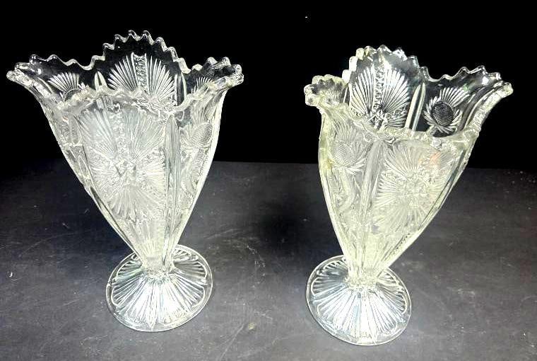 Pair of Pressed Glass Thistle Pattern Fan Vases, Ruffled Rim: Matching pair of fan-shaped thistle pattern vases with a wavy ruffled rim (rim style differs from Lot 111), on round starburst-cut feet. Approx. 7.5"H x 5"W at rim each.