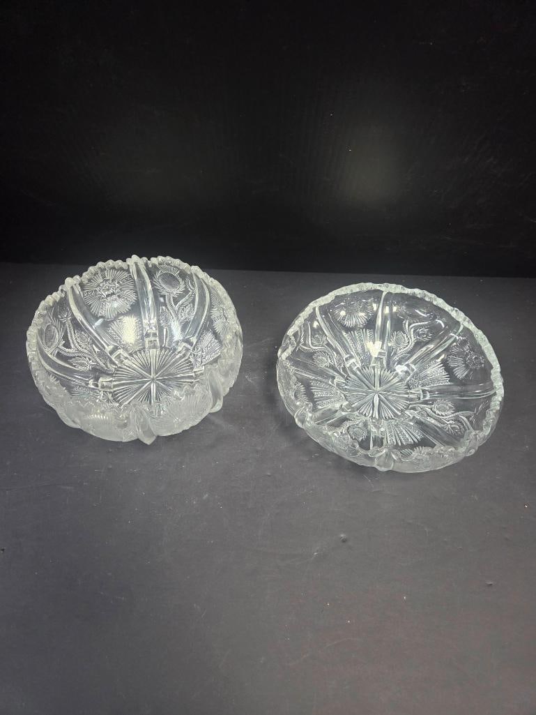 Pair of Pressed Glass Thistle Pattern Footed Bowls: Matching pair of low footed bowls (finger/berry bowls), thistle pattern, ruffled scalloped rim, short scalloped foot. Approx. 3"H x 6"W each.