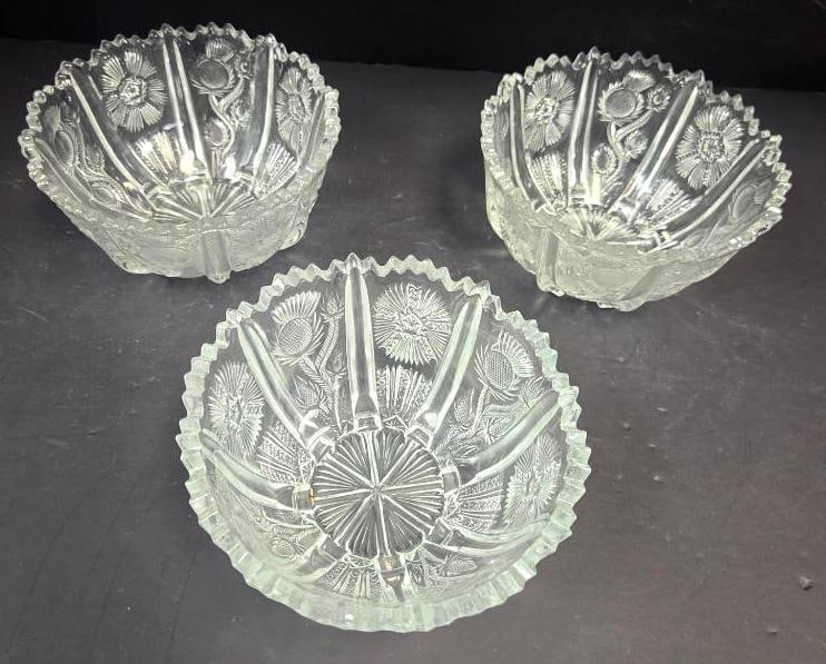 Set of Three Pressed Glass Thistle Pattern Bowls: Set of three matching bowls, thistle pattern, scalloped rim, no feet. Approx. 3"H x 6.5"W each.