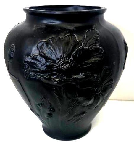 Black Glass Vase with Embossed Poppy Design: Single vase, black glass, embossed poppy flower and foliage design, flared rim. Approx. 8"H x 6.5"W.