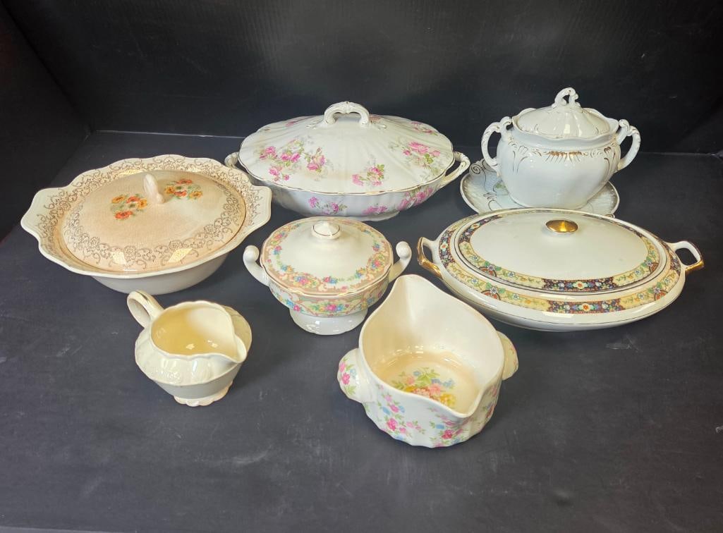 Mixed Grouping of Floral China Serving Pieces: Covered dish, gold lace-pattern lid with orange floral center. Approx. 5"H x 10"W.Covered oval vegetable dish, shell-form finial, pink floral pattern (does not match the item above). Approx. 6"H x