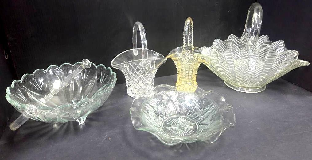 Pressed Glass Basket and Bowl Grouping, Five Pieces: Pale green-tinted pressed glass fan-pattern bowl with scalloped rim and two small button feet, approx. 8" diameter; clear pressed glass basket with diamond-lattice pattern and applied loop handle,