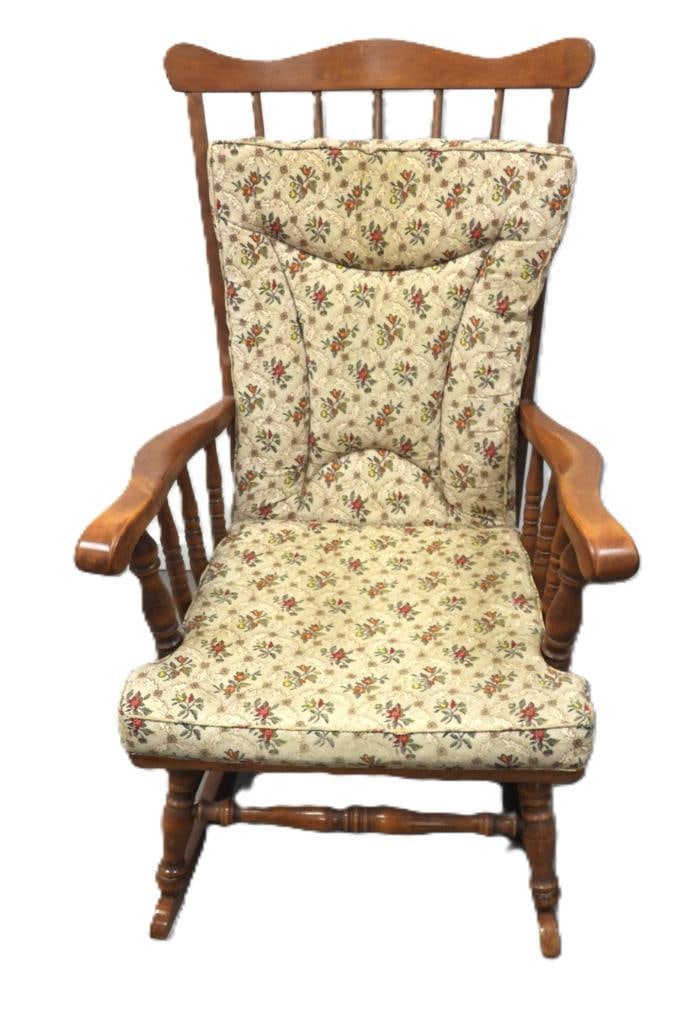 Pressed-Back Wooden Rocking Chair with Floral Cushions: Antique pressed-back wooden rocking chair with spindle arms and turned legs, fitted with a matching floral chintz seat cushion and tied back cushion, approx. 42" H.