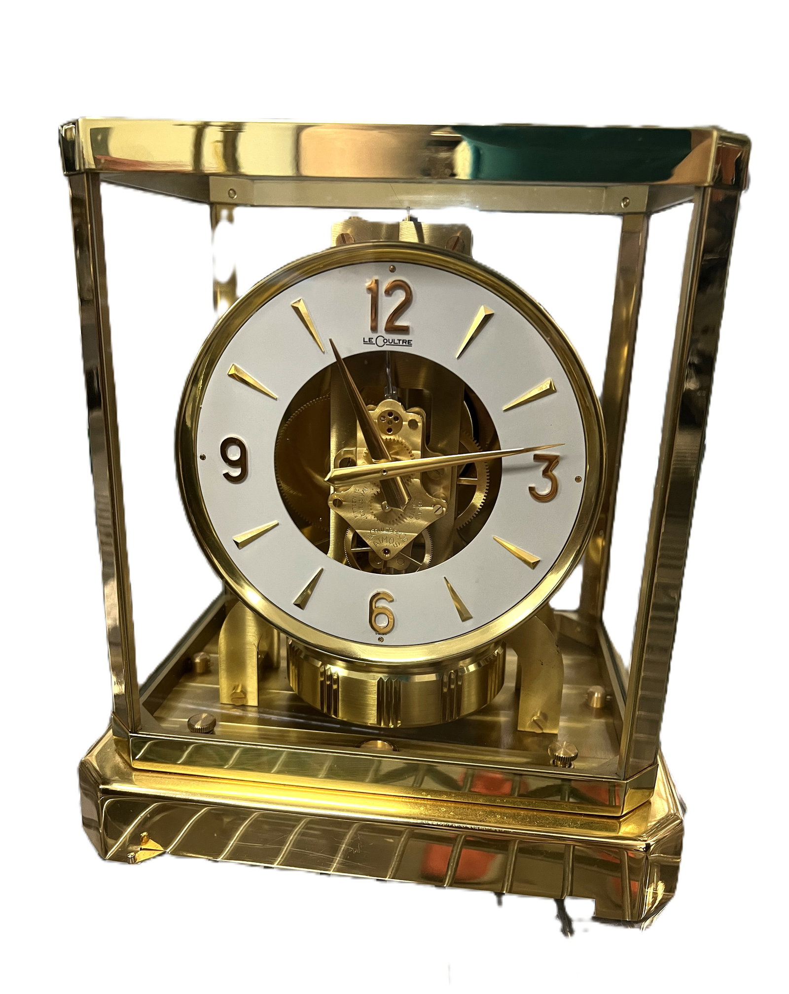 Brass Atmos clock: Works without batteries. Unable to determine if this keeps proper time. Beautiful brass clock.