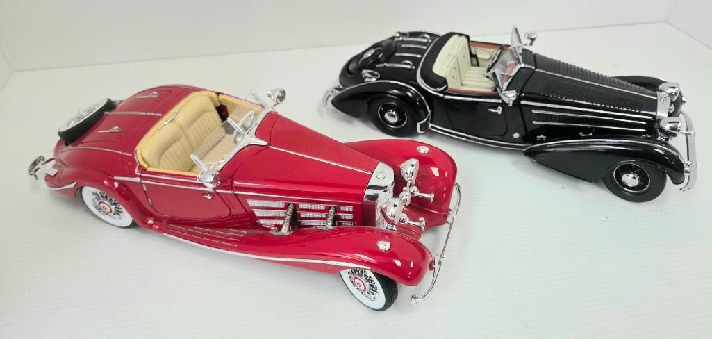 Pair of Mercedes-Benz 500K-Style Precision Diecast Model Cars: Matching pair of 1:24-scale precision diecast Mercedes-Benz 500K-style open touring cars, same body design and scale, one finished in red with cream interior (front grille badge reads "500 K"), the