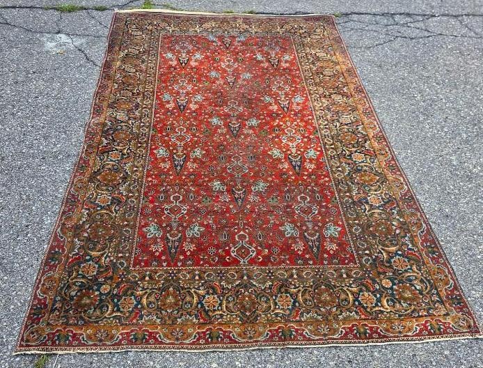 Red Sarouk-Style Persian Wool Rug: Hand-knotted red Sarouk/Ferahan-style Persian wool rug, dense allover floral and vine pattern in ivory, sage green, and navy, ivory floral guard border with wide indigo outer border, fringed ends, app