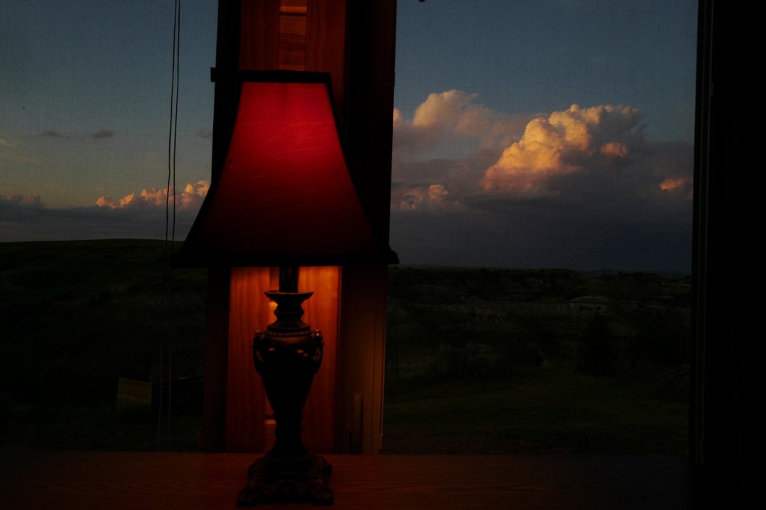 Rebecca Norris Webb, "Red Lamp, Near Medora, ND": Rebecca Norris Web, New York, New York. "Red Lamp, Near Medora, ND". Photograph, 2019. The artist has donated all of the proceeds of this sale to the Museum. Rebbeca Norris Webb: Originally a poet, Re