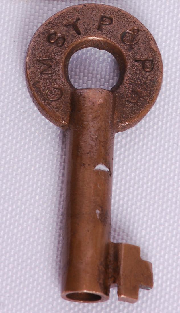 Chicago Milwaukee St. Paul & Pacific "RT" Switch Lock: Chicago Milwaukee St. Paul & Pacific "RT" Switch Lock KeyChicago Milwaukee St. Paul & Pacific / Milwaukee Road Railroad repair track switch lock key. Stamped with CMSTP&PR on the front of th