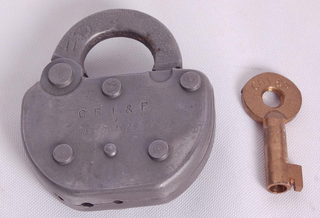 Adlake Rock Island Railroad Switch Lock w/ Key: Adlake Rock Island Railroad Switch Lock w/ KeyAdlake Rock Island Railroad Switch Lock w/ Key. Body of the lock stamped w/ CRI&P. Key cover is embossed w/ Adlake. The key is stamped CRI&P w/ Adlake on