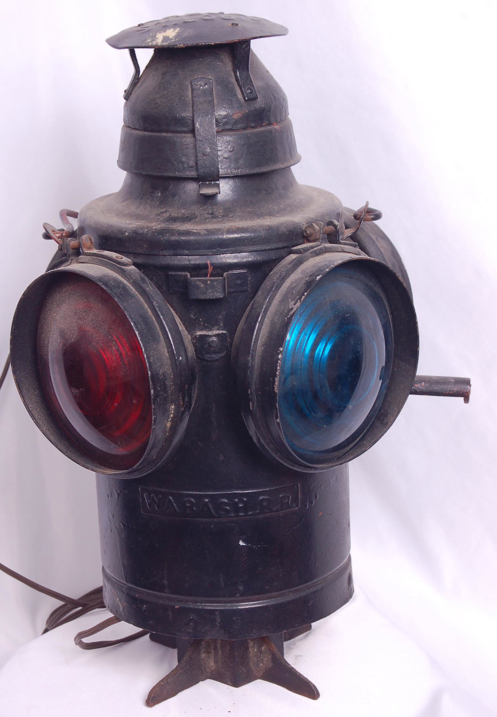 Handlan Wabash Electrified Switch Lantern: Handlan Wabash Electrified Switch Lantern Handlan Wabash Electrified Switch Lantern. Body has an older restoration and has been retrofitted with a light bulb and plugin cord. The tag on the body reads