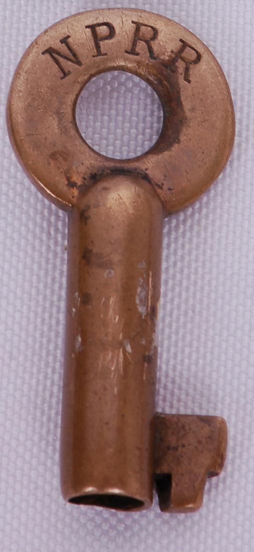 Northern Pacific Railroad Switch Lock Key: Northern Pacific Railroad Switch Lock KeyNorthern Pacific Railroad Switch Lock Key. Stamped with NPRR on the front, no makers mark on the reverse.