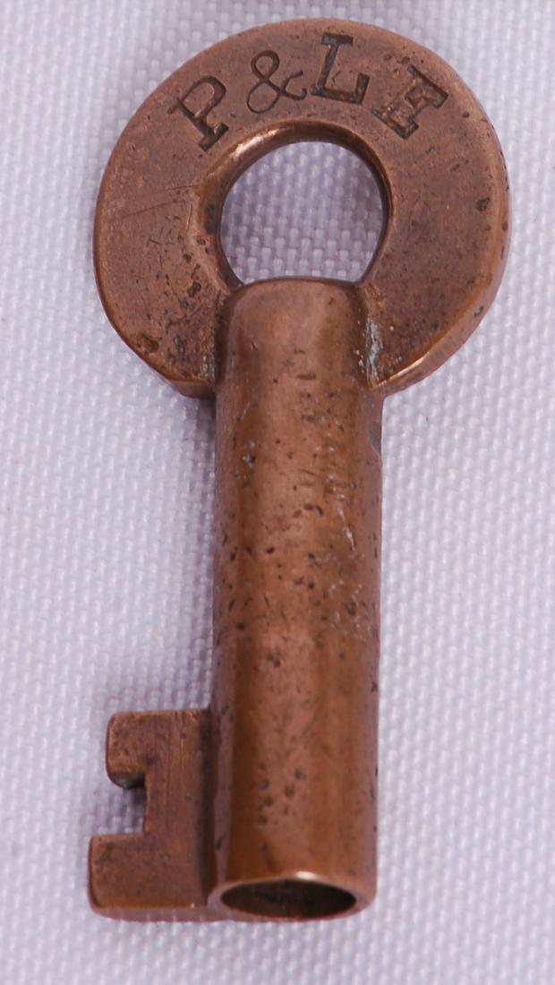 Pittsburgh and Lake Erie Railroad Slaymaker Switch Lock: Pittsburgh and Lake Erie Railroad Slaymaker Switch Lock KeyPittsburgh and Lake Erie Railroad Slaymaker Switch Lock Key. Stamped with P&LE on the front. The reverse of the key is stamped with Slaymaker