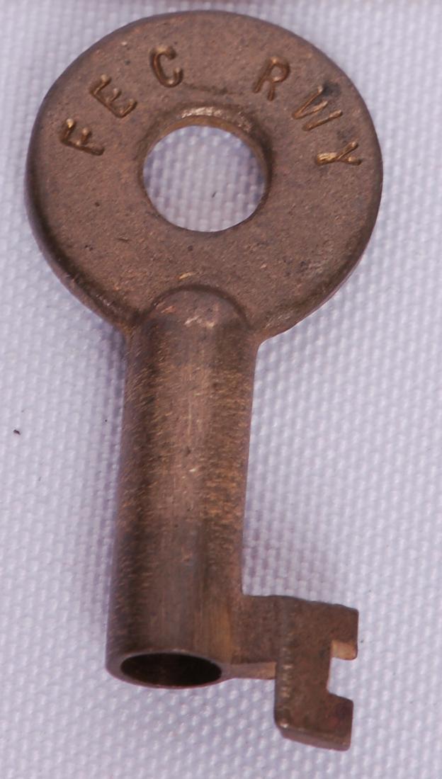 Florida East Coast Railroad Adlake Switch Lock Key: Florida East Coast Railroad Adlake Switch Lock KeyFlorida East Coast Railroad Adlake Switch Lock Key. Stamped with FEC RWY on the front with Adlake on the reverse.