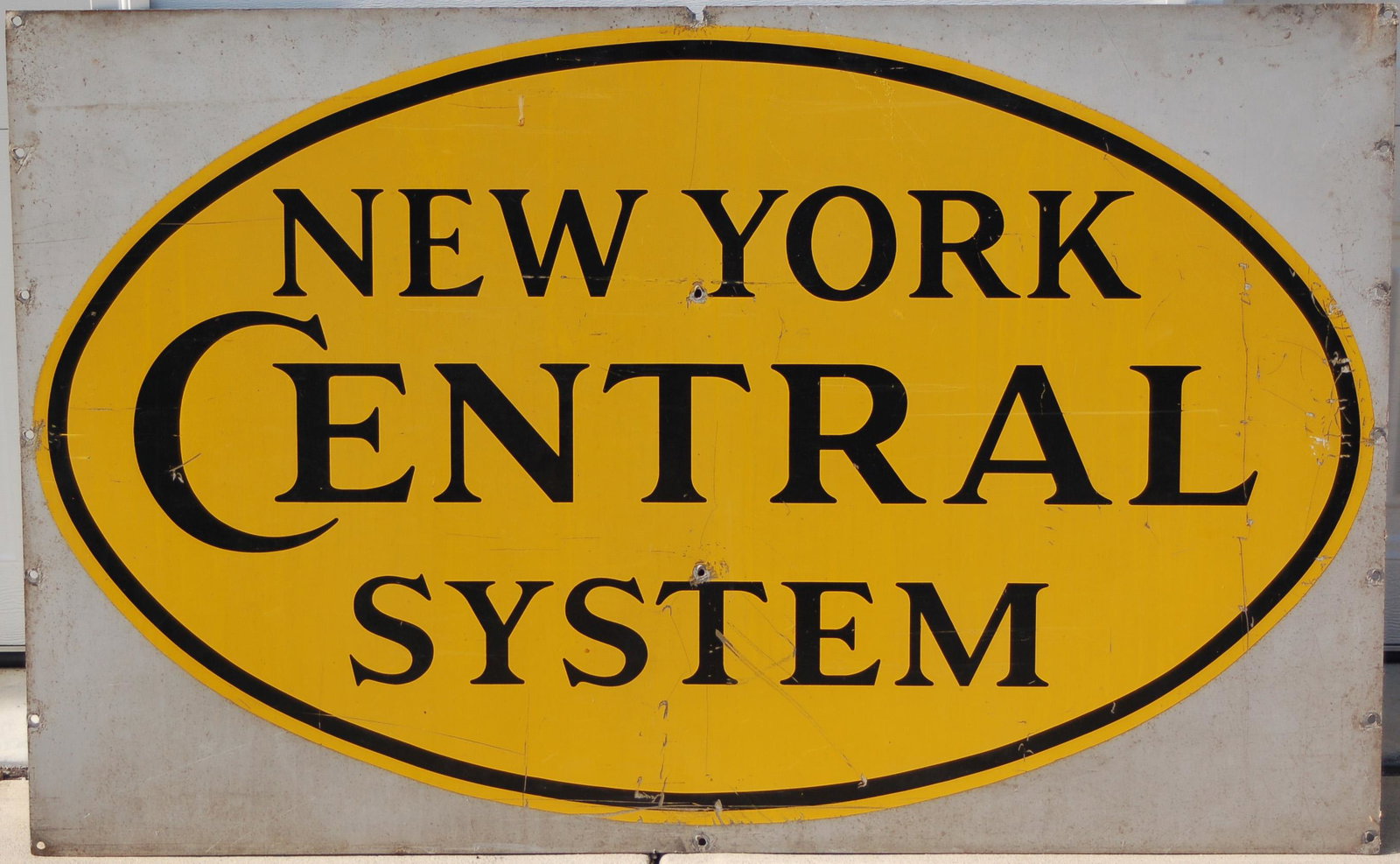 Large Metal New York Central System Railroad Sign: Large Metal New York Central System Railroad Sign Large Metal New York Central System Railroad Sign. These were used on both New York Central Piggyback trailers and some covered hoppers. Measures 48&q