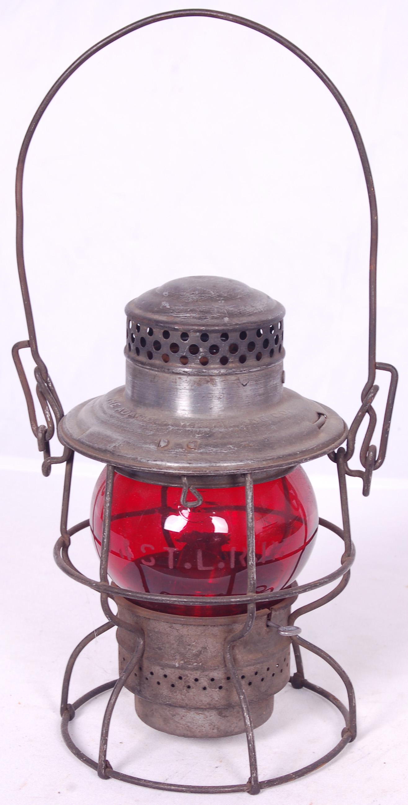 Adams & Westlake Minneapolis & St. Louis Railroad Red: Adams & Westlake Minneapolis & St. Louis Railroad Red Short Globe Lantern Adams & Westlake Minneapolis & St. Louis Railroad Red Short Globe Lantern. Lantern embossed with M. & ST. L.R.R. on the should