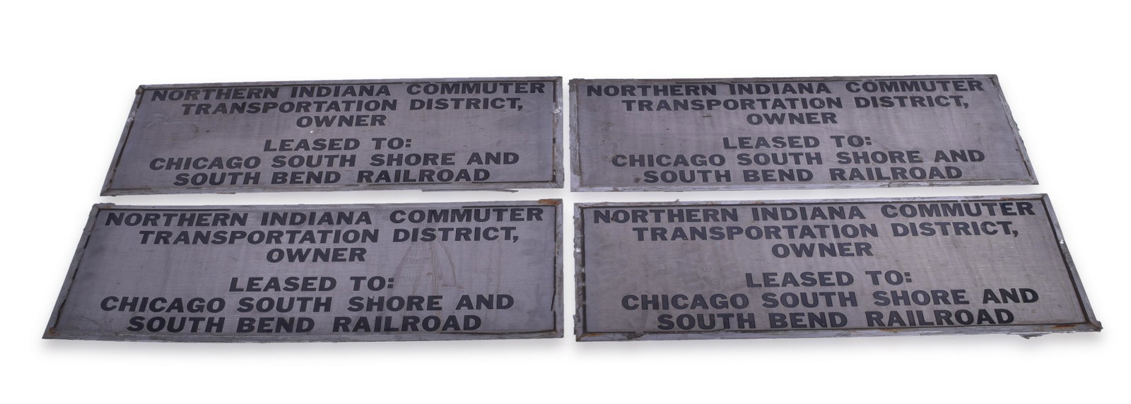 Four Chicago, South Shore, & South Bend Railroad /: Four Chicago, South Shore, & South Bend Railroad / NICTD Nippon Sharyo Commuter Car Stainless Steel Lessor Plates Four plates measure 27" x 9 3/4" Plates are stainless steel with etched black letterin