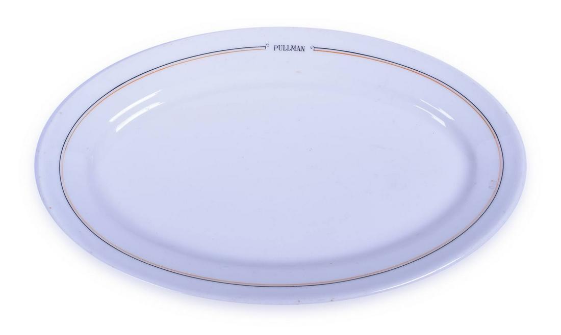 Pullman Calumet Bauscher 12 3/4" Oval Platter: Pullman Calumet Bauscher 12 3/4" Oval Platter Gold and black pinstriping around the outer edge. The gold band is in nice condition, fairly strong. Light wear to the "P" in Pullman. The surface does ap