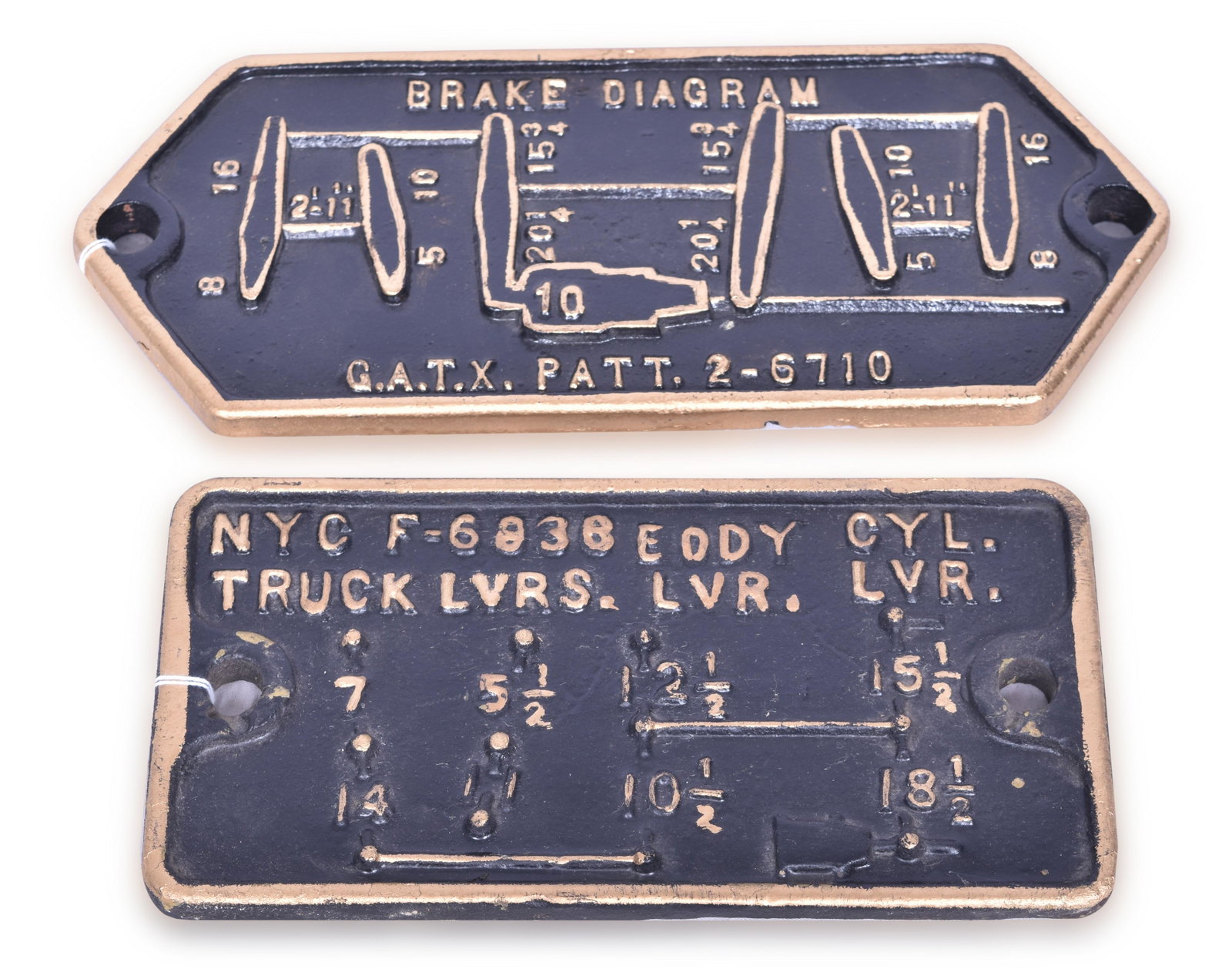 Pair of New York Central and GATX Airbrake Diagram and Truck Lever Plates: Pair of cast iron railroad truck lever and air brake diagram plates. Includes restored New York Central F-6838 truck lever diagram plate measuring 9 1/4" x 4 3/4" and GATX 2-6710 brake diagram plate m