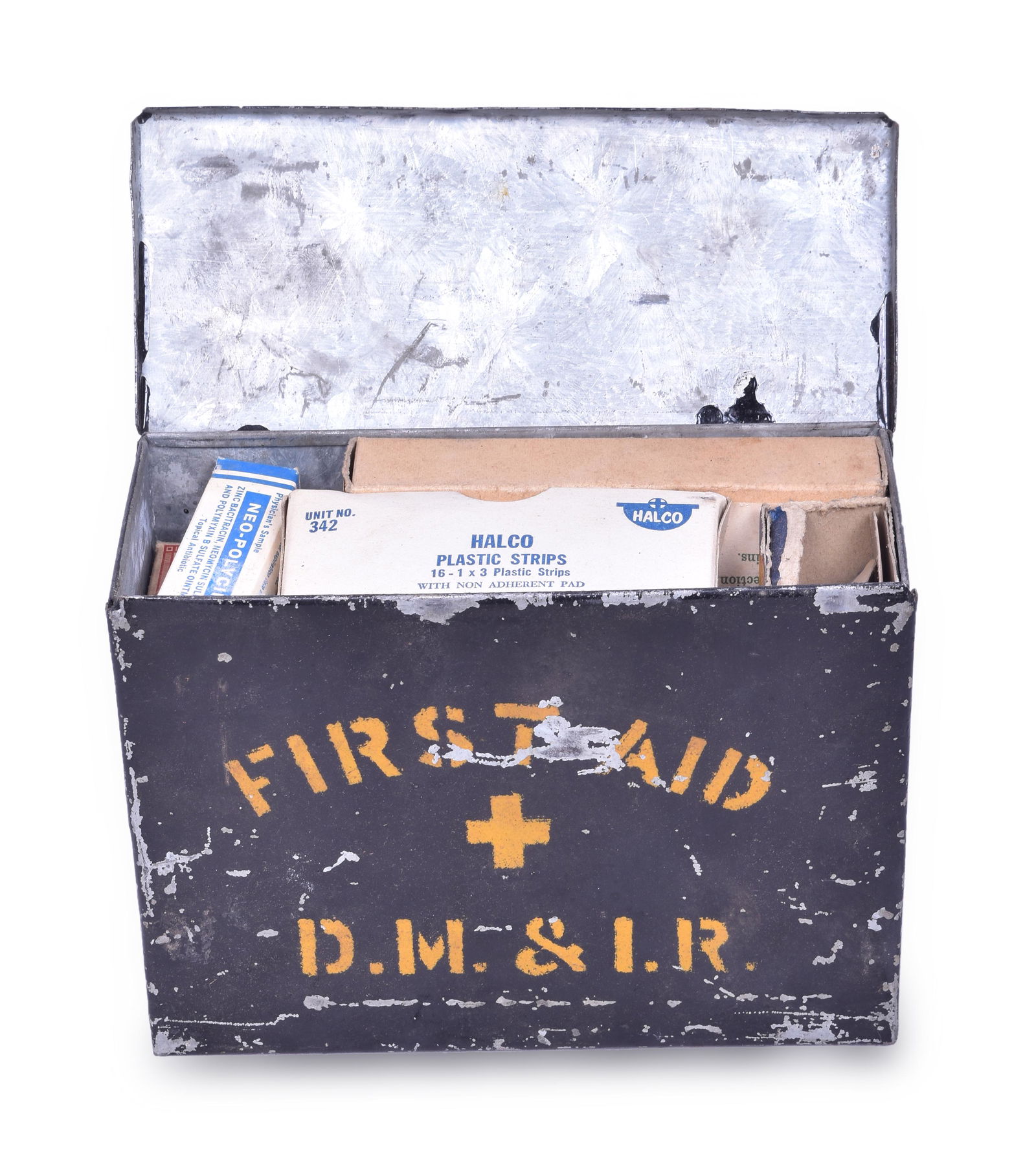 Duluth Missabe and Iron Range Railroad First Aid Kit w/ Contents: Duluth Missabe and Iron Range first aid kit in painted steel box. Front of the box is stenciled with First Aid D.M. & I.R. The interior has period contents from Halco, Neopolycin, Red Cross Bandage, a