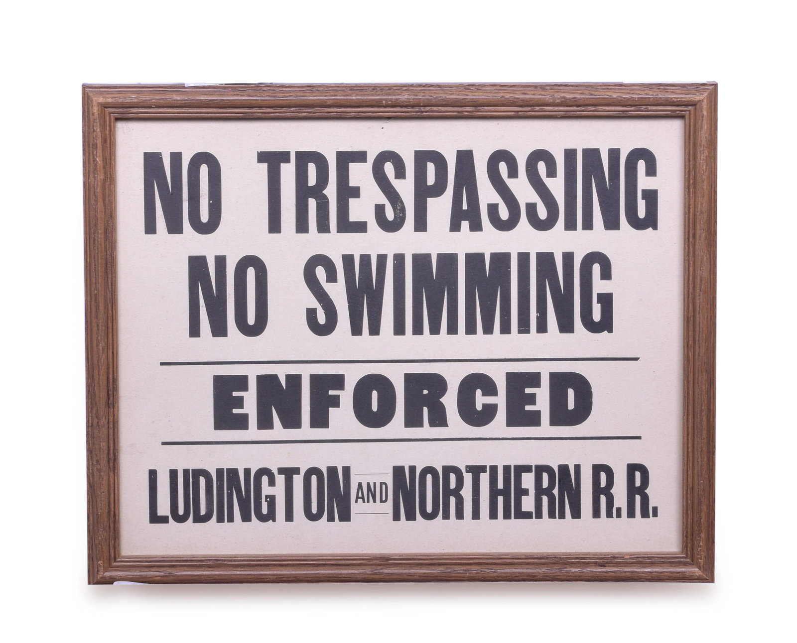 Ludington and Northern Railroad - No Trespassing Sheet: Framed 13 1/2" x 10 1/2" sheet from the Ludington and Northern Railroad for No Trespassing / No Swimming. Sheet has light pencil writing on the upper left corner. Nice sheet with no creases, rips or t