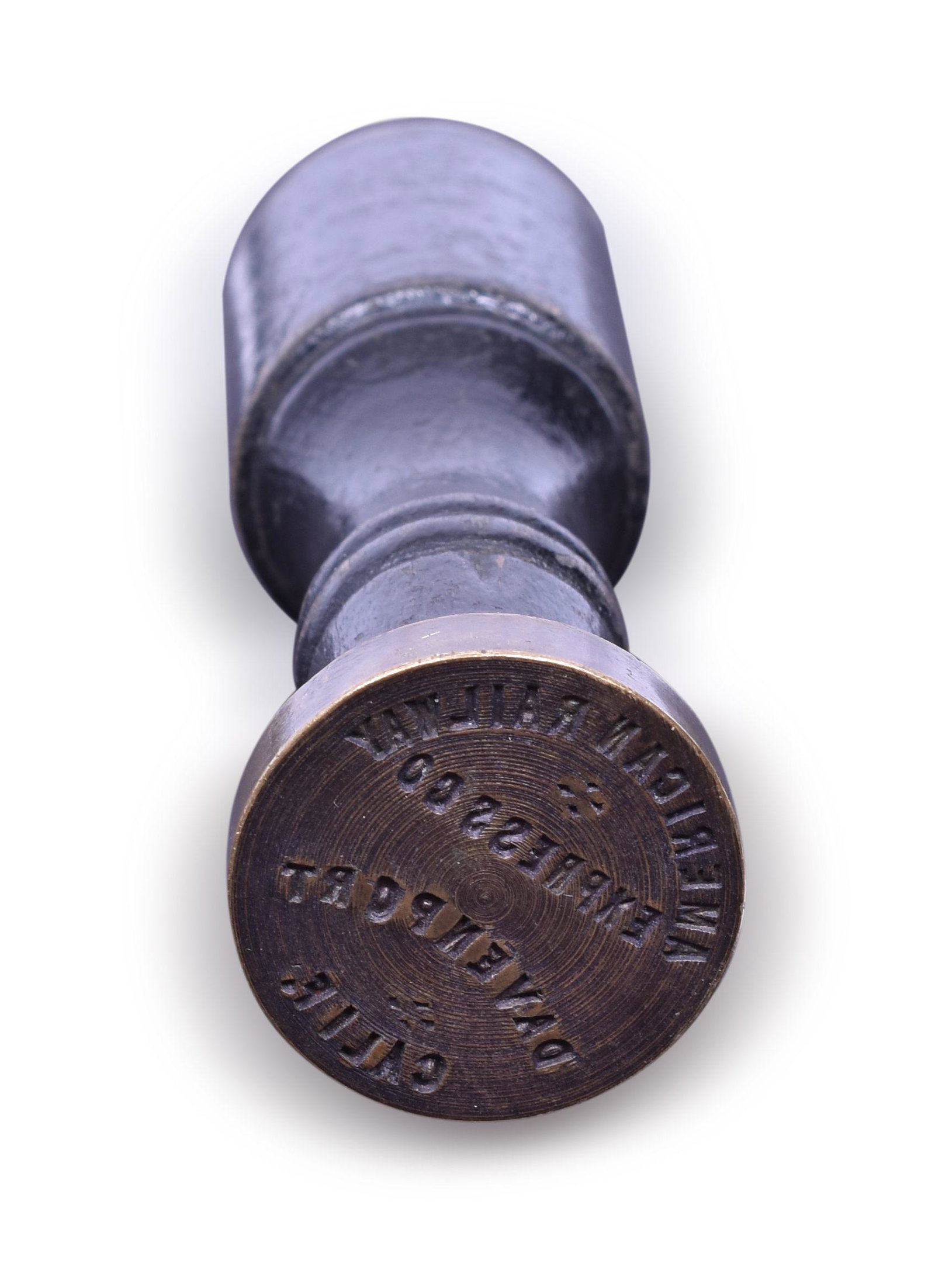 American Railway Express Co. Davenport California Round Head Wax Sealer: Tall wooden handle, round oval head. Stamps American Railway Express Co Davenport Calif. Handle shows light wear, the head is in good condition.