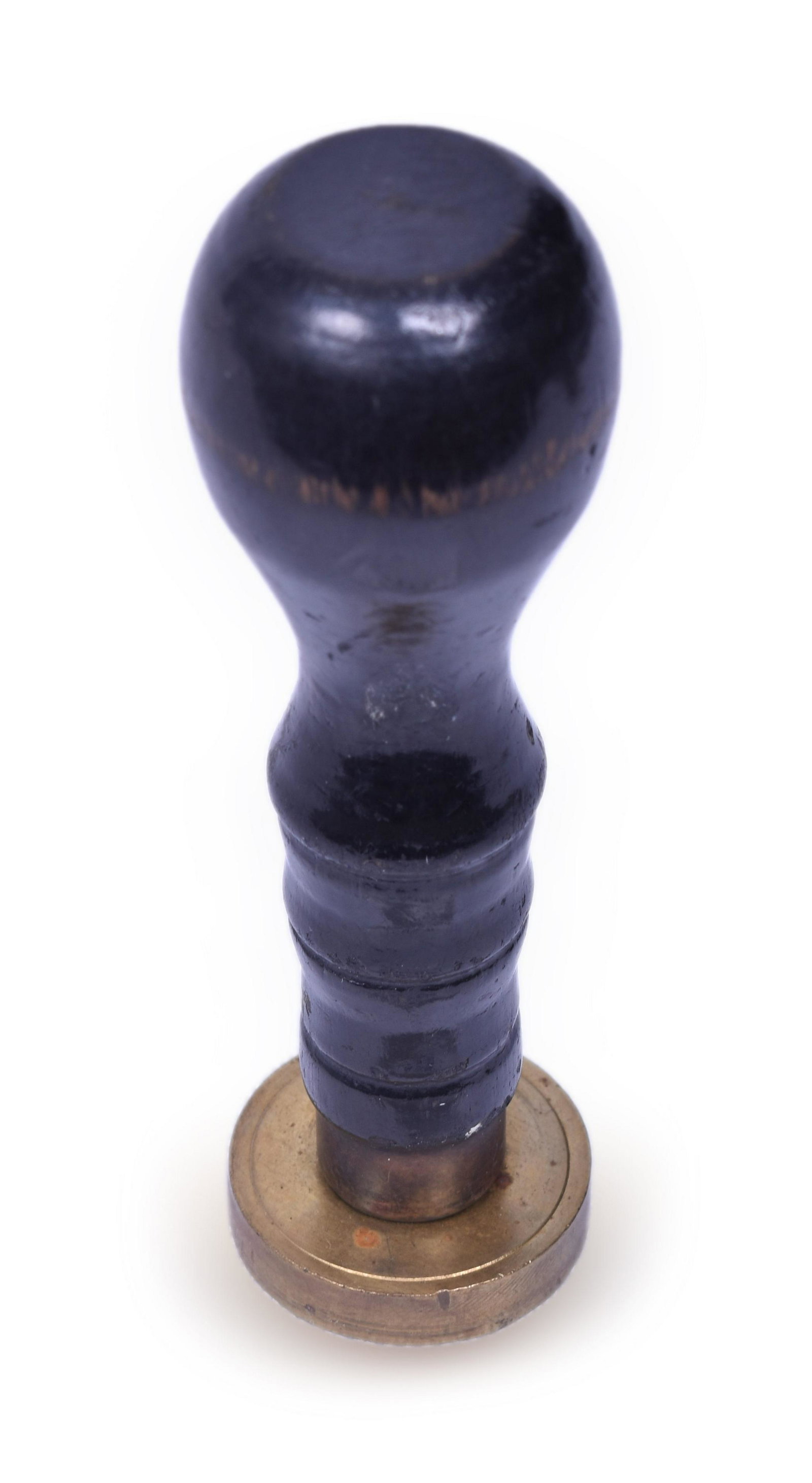 Round Railway Express Agency Grand Island Nebraska Wax Sealer #7: Round Railway Express Agency wax sealer with tall wooden handle. Stamps RY.EX.AGY.INC #7 GRAND ISLAND, NEB. The sealer shows light wear, some residue in the lettering on the head. Handle shows light w
