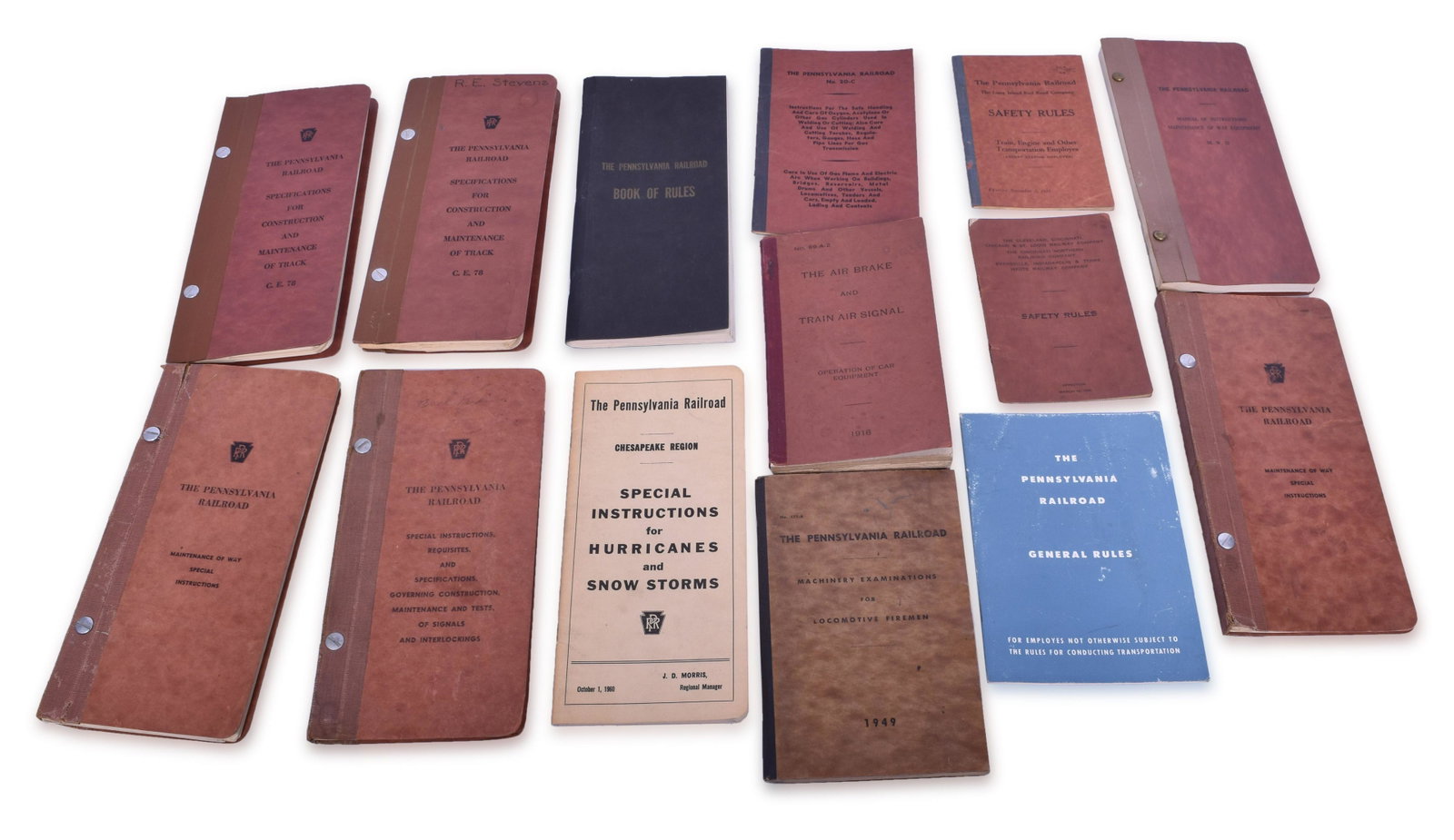 Fourteen Pennsylvania Railroad Rule and Instruction Books: Fourteen Pennsylvania Railroad Rule and Instruction Books Fourteen Pennsylvania rule books covering topics including but not limited to; special instructions for Hurricane and Snow Storms, 1949 Firema