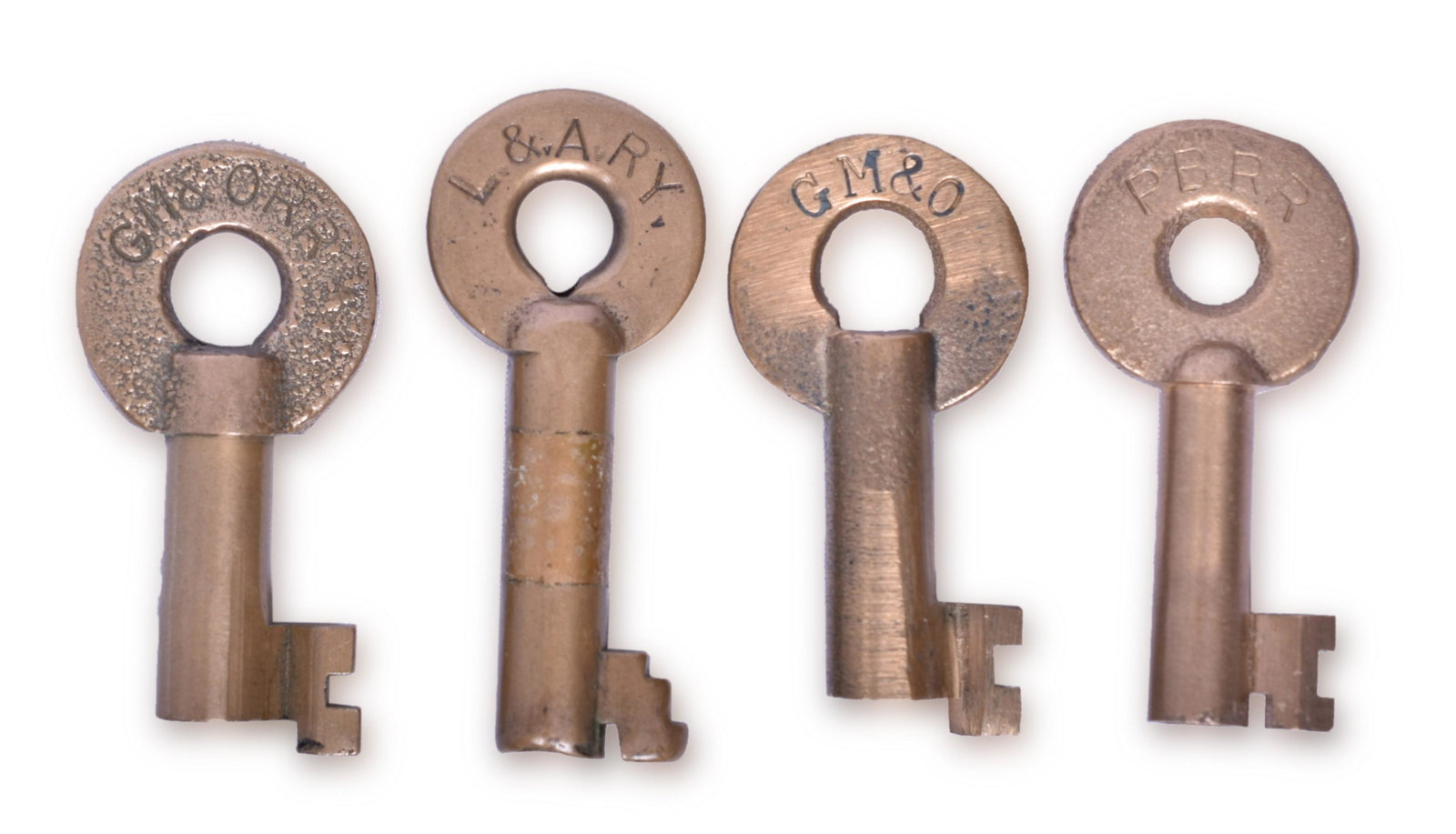 Four Railroad Keys Louisiana and Arkansas, Gulf Mobile and Ohio, New Orleans Public Belt: Four Railroad Keys Louisiana and Arkansas, Gulf Mobile and Ohio, New Orleans Public Belt Group of four keys including Adlake Louisiana and Arkansas stamped L. & A. RY. with Adlake 5101 on the reverse,