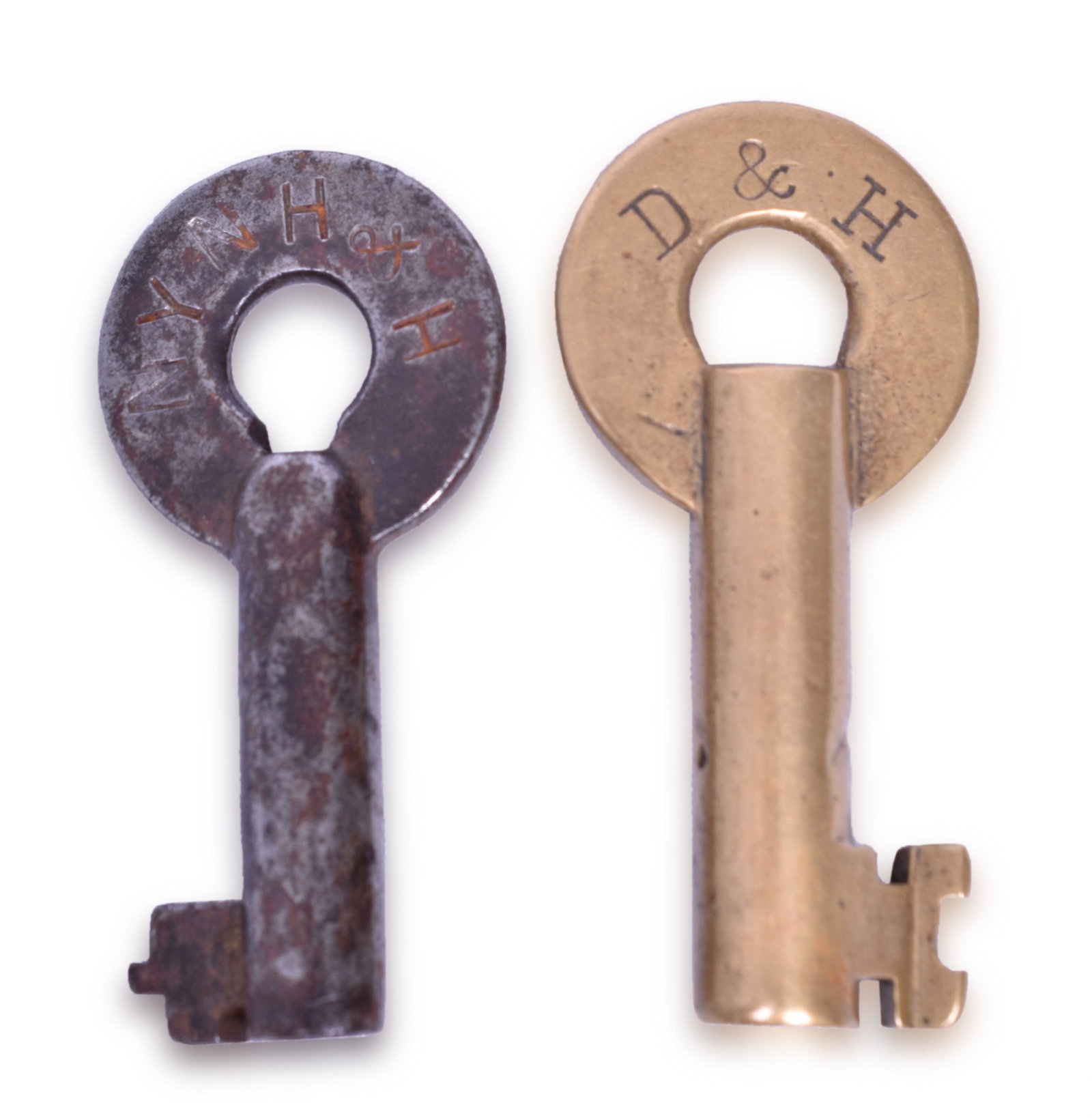 Delaware and Hudson and New Haven Brass and Steel Railroad Keys: Delaware and Hudson and New Haven Brass and Steel Railroad Keys The first key is a steel New Haven stamped NYNH&H in block font with F645 on the reverse. The key has some light discoloration. The seco